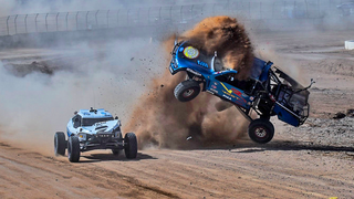 Holy Crap: Tiny Buggy Hip-Checks A Trophy Truck Into Oblivion Mid-Race